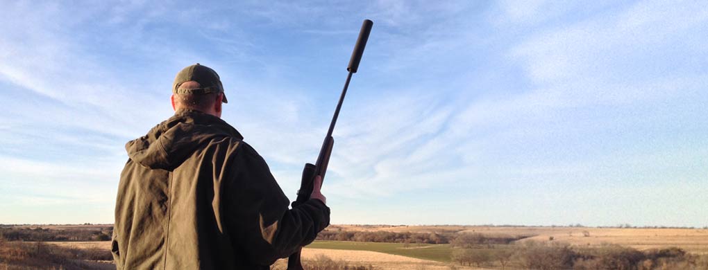 Hunter With Silencer on Custom Rifle